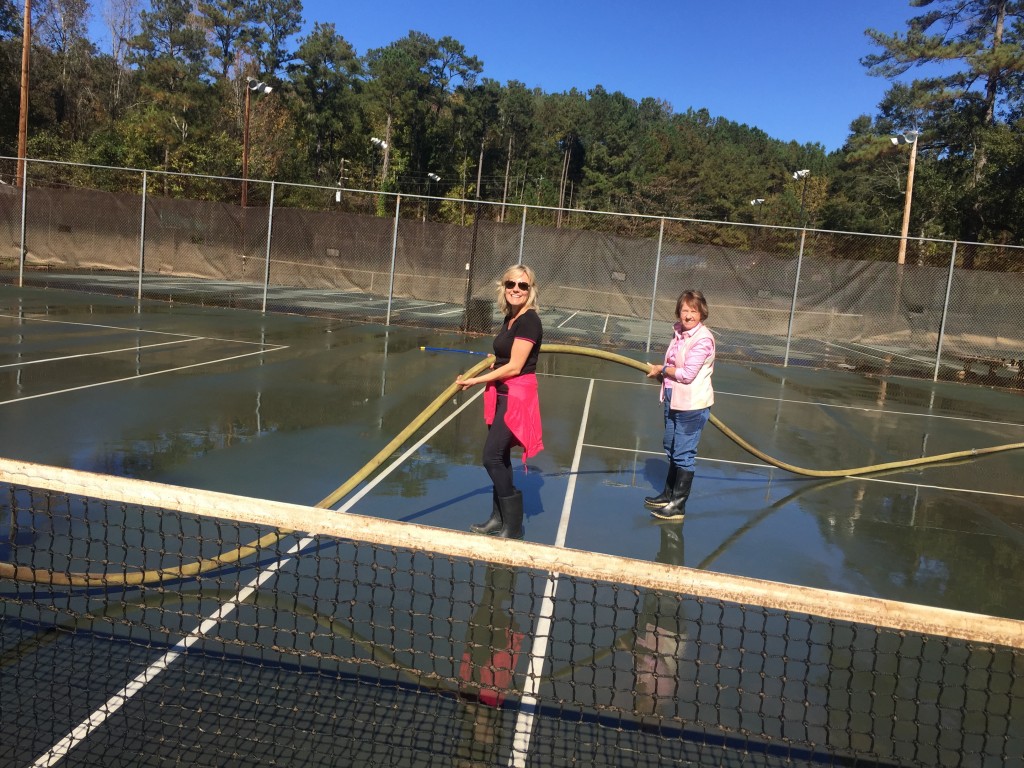 Andrea Creighton and Jeannie Watson assist, but also had turns operating the big hose!